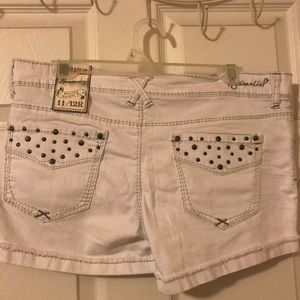 Hydraulic white denim shorts